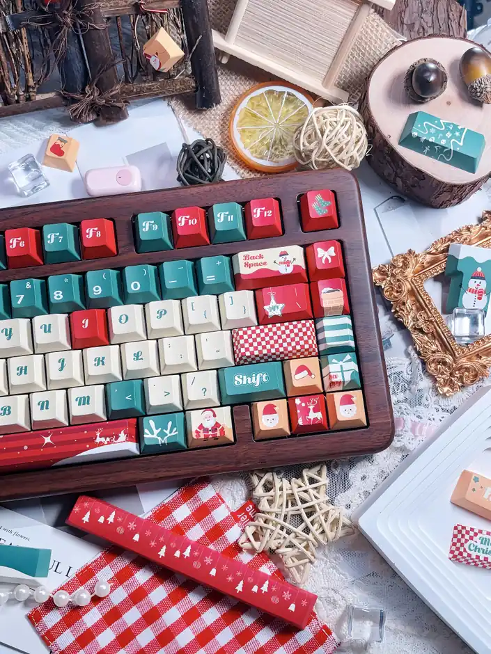Right-side detail of Christmas Tree keycaps with gift, Santa and checkerboard designs