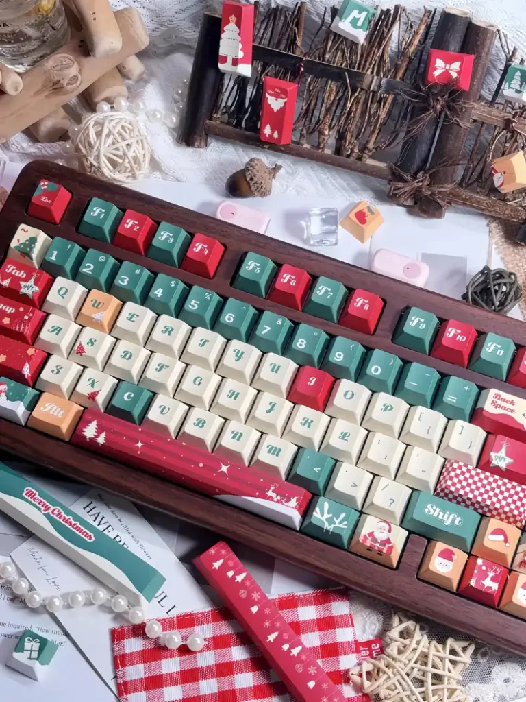 Angled view of Christmas Tree keycaps with Santa and festive novelty keys