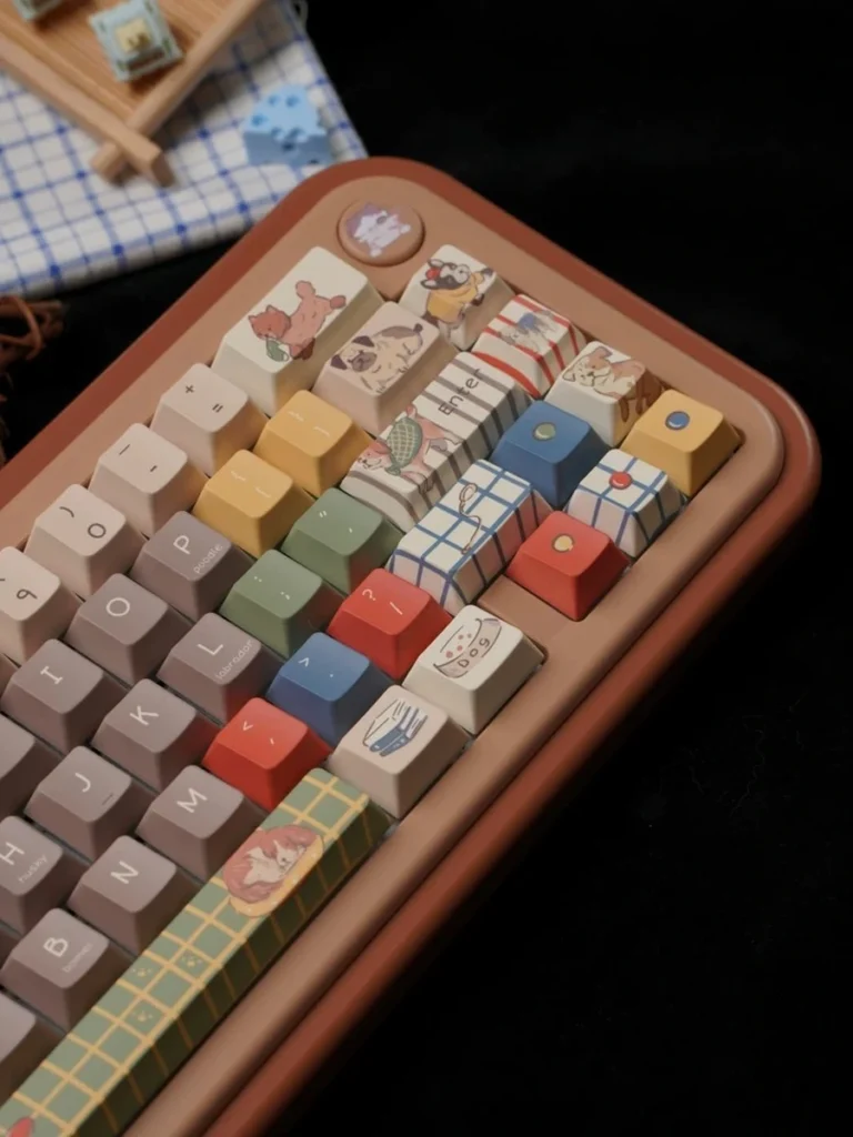 Right-side detail of Playful Pups keycaps with plaid and cartoon dog designs