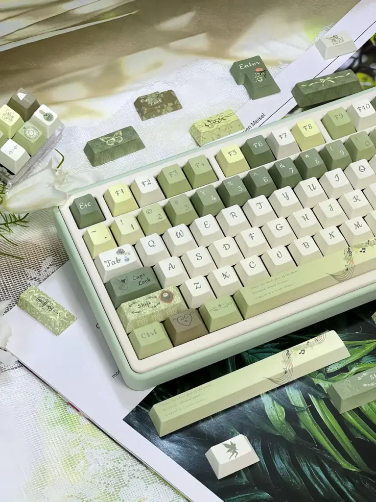 Left-side detail of Quiet Depths keycaps with botanical patterns and musical spacebar